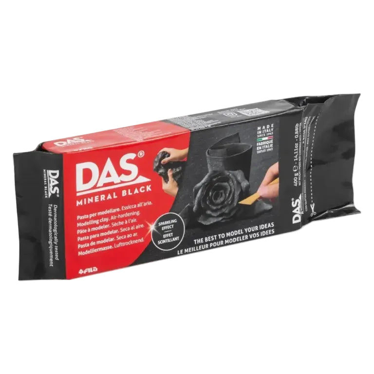 Packaging of DAS mineral black modeling clay with images of hands working with the clay.