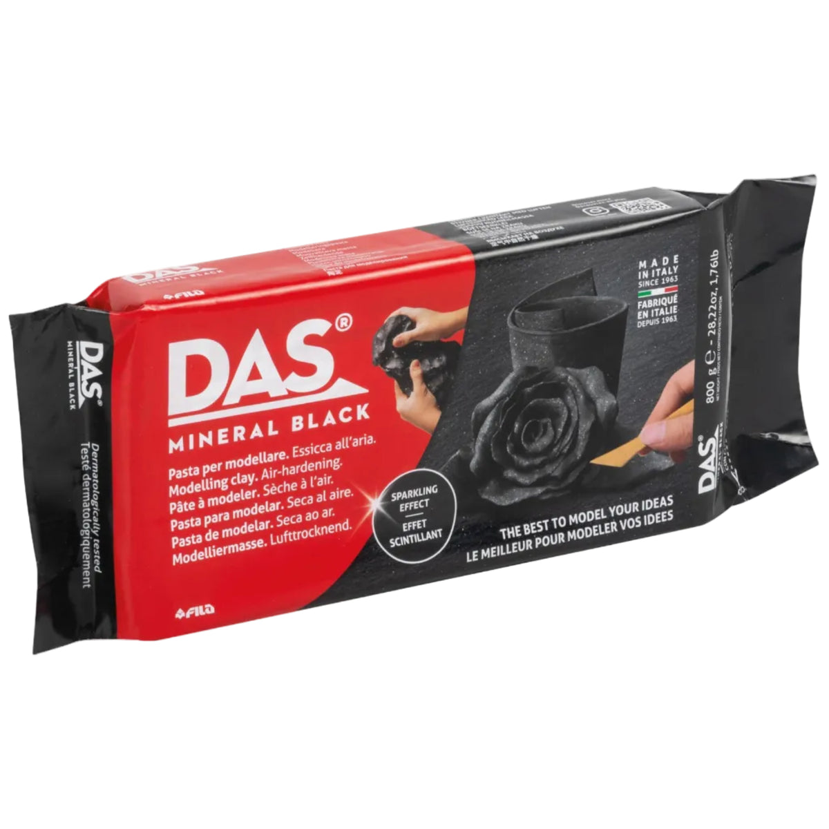 A package of DAS Mineral Black air-hardening clay modeling paste, shown on a clean white background. The packaging is red and black with white text, featuring a photo of hands molding a black clay rose.